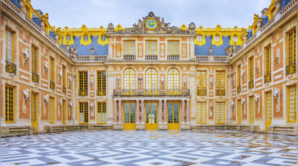 The opulent Palace of Versailles, a symbol of French royalty and grandeur.