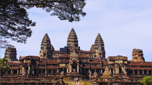 The magnificent Angkor Wat temple bathed in the warm light of sunrise.