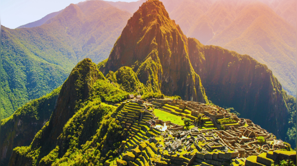 An aerial view of Machu Picchu nestled among the Andean peaks of Peru.