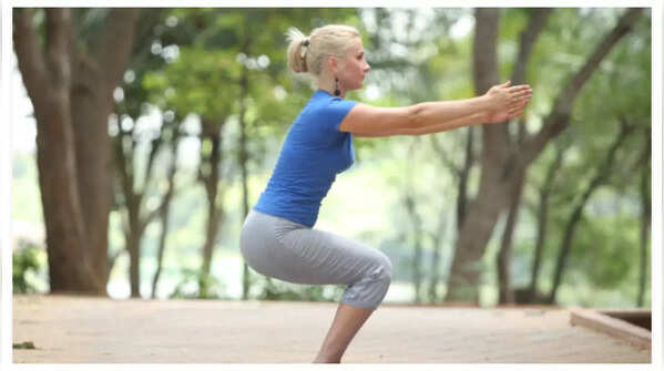 Chair Pose engaging large muscles for effective weight loss