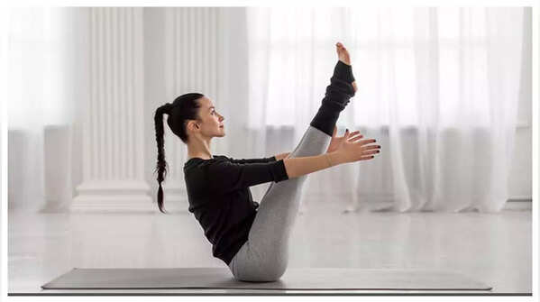 Boat Pose strengthening core and improving balance