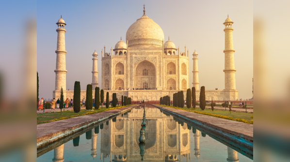 The iconic Taj Mahal shimmering in the daylight.