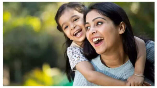 A parent modeling friendly social behavior