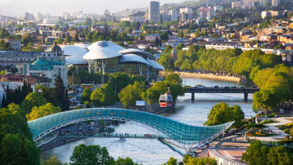 Sunset over Tbilisi, Georgia, showcasing its unique architecture.