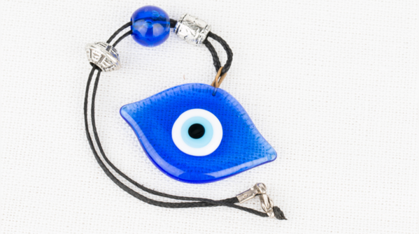A broken Evil Eye amulet signifies deflected negative energy