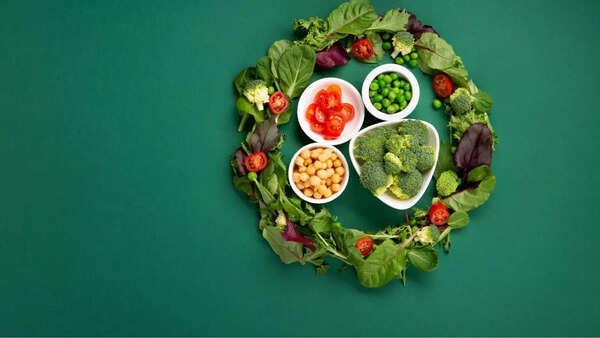 Variety of plant-based protein sources: legumes, soy products, quinoa, nuts, and seeds
